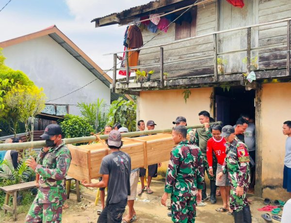 SENTUHAN KEMANUSIAAN PRAJURIT SATGAS YONKAV 3/AC DALAM PROSESI PEMAKAMAN WARGA